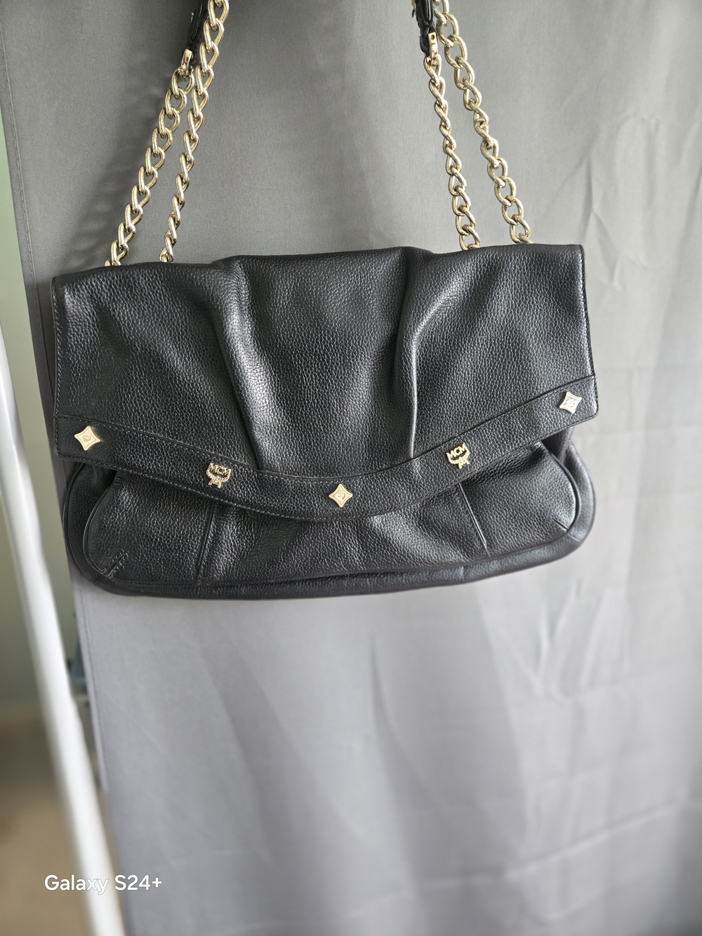 MCM Black Pebbled Leather Bag with Gold Accents